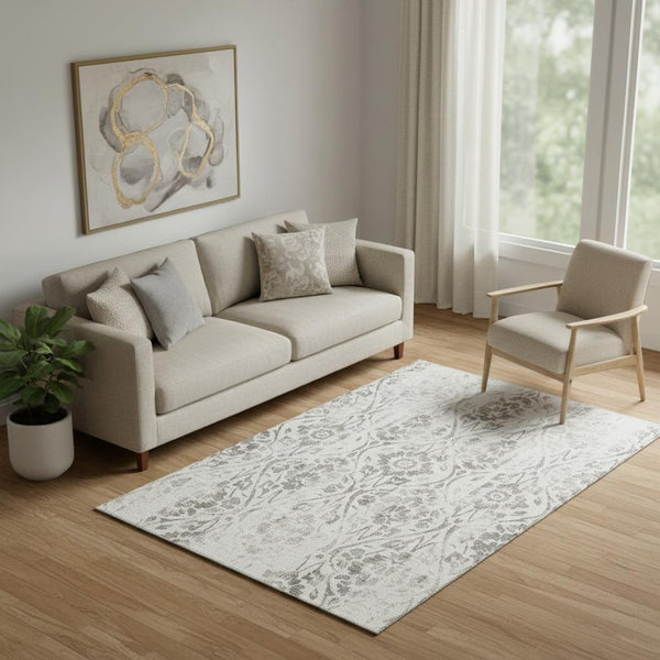 HomeRoots 5' X 8' Ivory And Beige Floral Area Rug - Washable, UV Protected, Stain Resistant for Busy Homes 669056