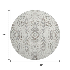 HomeRoots 8' Ivory and Beige Floral Round Rug – Washable, UV Protected, Perfect for Family Spaces & Décor 669057