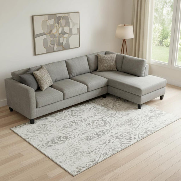 HomeRoots 9' X 12' Ivory and Beige Floral Washable Area Rug – Durable, Stain-Resistant, UV-Protected Elegance 669059