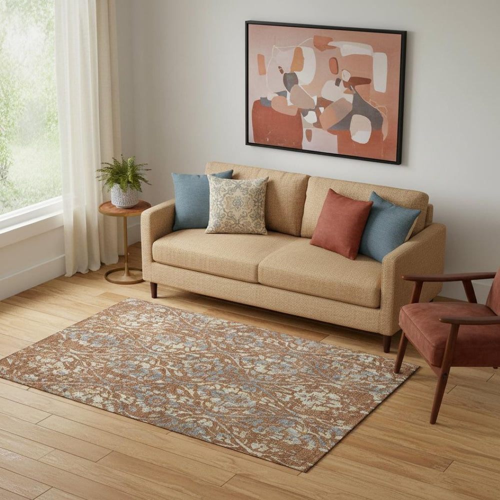 HomeRoots 5' X 8' Floral Area Rug in Rust and Gray - Washable, UV-Protected, Stain-Resistant, Durable Design 669062