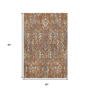 HomeRoots 5' X 8' Floral Area Rug in Rust and Gray - Washable, UV-Protected, Stain-Resistant, Durable Design 669062