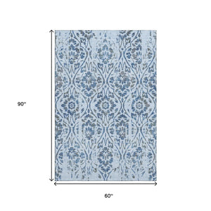 HomeRoots 5' X 8' Sky Blue Floral Washable Area Rug with UV Protection - Stylish, Durable & Easy to Clean! 669074