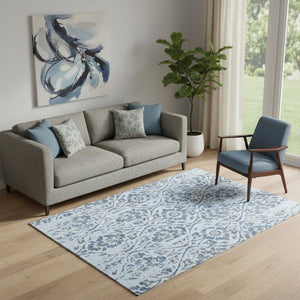 HomeRoots 5' X 8' Sky Blue Floral Washable Area Rug with UV Protection - Stylish, Durable & Easy to Clean! 669074