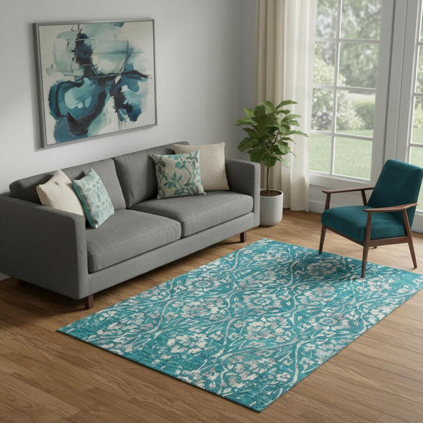 HomeRoots 5' X 8' Teal and Beige Floral Area Rug - Washable, UV Protected, Durable for High-Traffic Spaces 669080