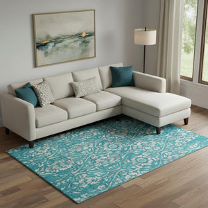 HomeRoots 10' X 14' Teal And Beige Floral Washable Area Rug – Durable, UV-Protected, Perfect for Family Spaces 669084