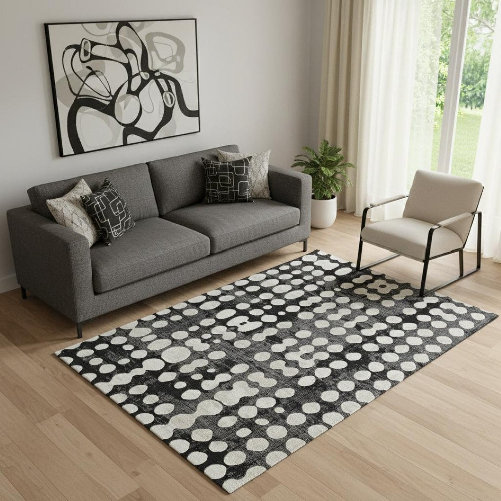 HomeRoots 5' X 8' Black And Ivory Polka Dot Washable Area Rug - Durable, UV-Protected, Ideal for Any Room 669092
