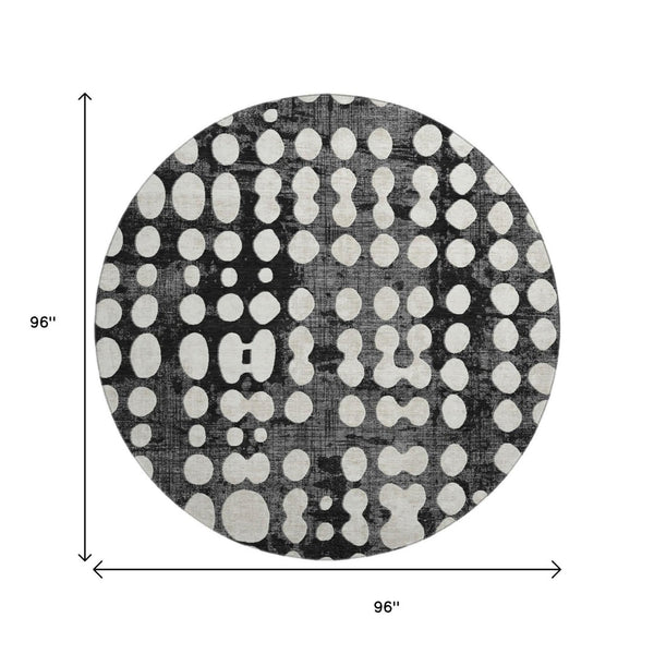 HomeRoots 8' Black and Ivory Polka Dot Washable Round Rug - UV Protection, Stylish, Durable, Easy-Clean Design 669093