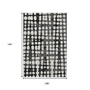 HomeRoots 9' X 12' Polka Dot Washable Area Rug - Stylish Black & Ivory Design with UV Protection & Comfort 669095