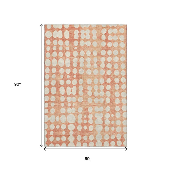 HomeRoots 5' X 8' Coral & Beige Polka Dot Area Rug – Soft, Washable, UV Protected for Stylish Durability! 669104