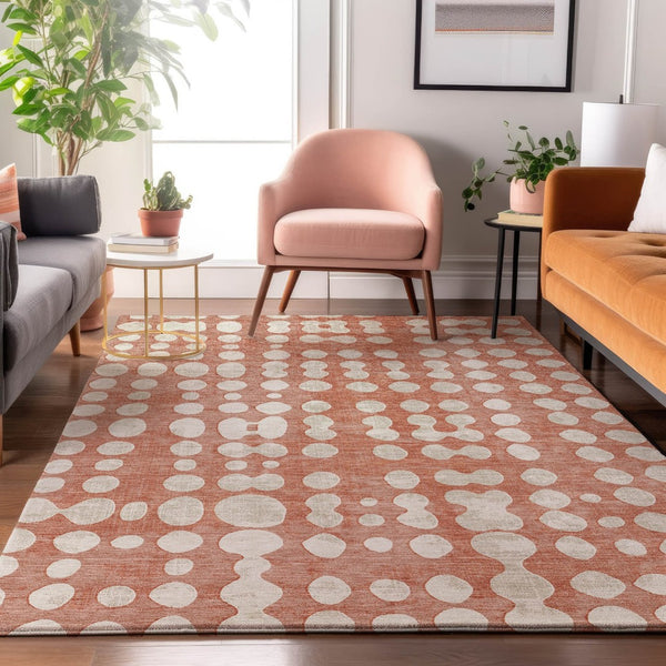 HomeRoots 10' x 14' Salmon and Ivory Polka Dot Washable Area Rug with UV Protection for Stylish Family Spaces 669144