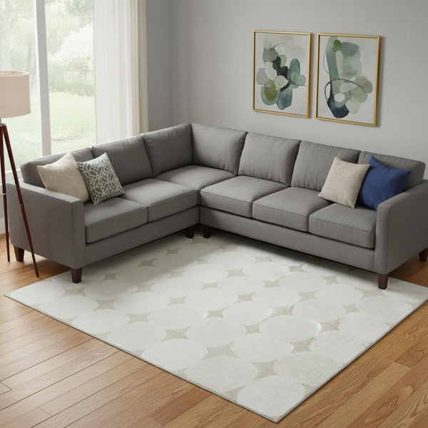HomeRoots 8' X 10' Beige and Ivory Washable Area Rug - Abstract Geometric Design with UV Protection & Durability 669160