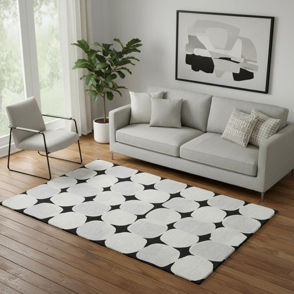 HomeRoots 5' X 8' Stylish Black and Ivory Abstract Geometric Washable Area Rug with UV Protection & Comfort 669164