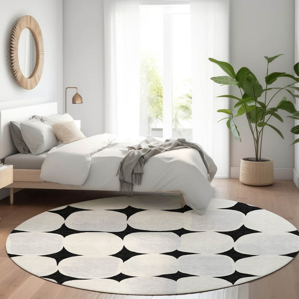 HomeRoots 8' Black and Ivory Abstract Geometric Washable Round Rug - Durable, Stylish & UV Resistant Design 669165