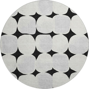 HomeRoots 8' Black and Ivory Abstract Geometric Washable Round Rug - Durable, Stylish & UV Resistant Design 669165