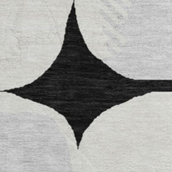 HomeRoots 8' Black and Ivory Abstract Geometric Washable Round Rug - Durable, Stylish & UV Resistant Design 669165