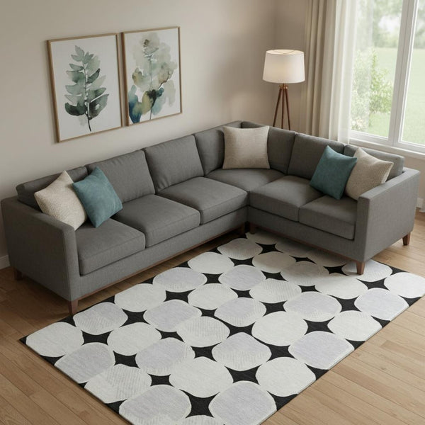 HomeRoots 8' X 10' Stylish Black and Ivory Abstract Geometric Area Rug - Washable, UV Protected & Durable Design 669166