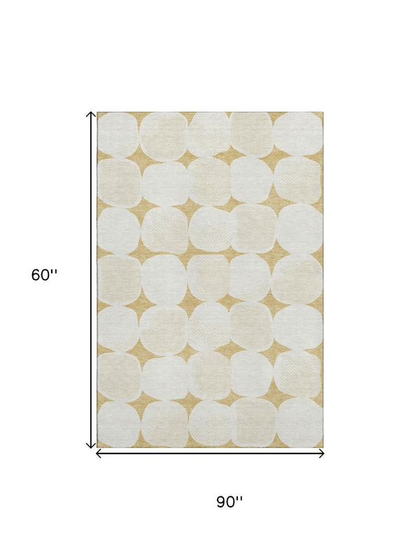 HomeRoots 5' X 8' Gold and Ivory Abstract Geometric Area Rug – Stylish, Washable, UV-Protected for Modern Homes 669182