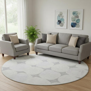 HomeRoots 8' Gray and Ivory Abstract Geometric Washable Round Rug - Stylish, Durable, UV-Protected Design! 669189