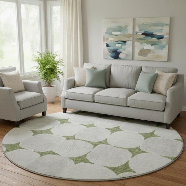 HomeRoots 8' Green and Ivory Abstract Geometric Round Rug - Washable, UV Protected, Perfect for High-Traffic Areas 669195