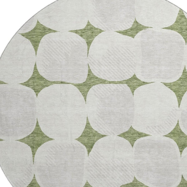 HomeRoots 8' Green and Ivory Abstract Geometric Round Rug - Washable, UV Protected, Perfect for High-Traffic Areas 669195