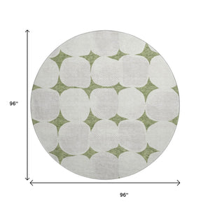 HomeRoots 8' Green and Ivory Abstract Geometric Round Rug - Washable, UV Protected, Perfect for High-Traffic Areas 669195