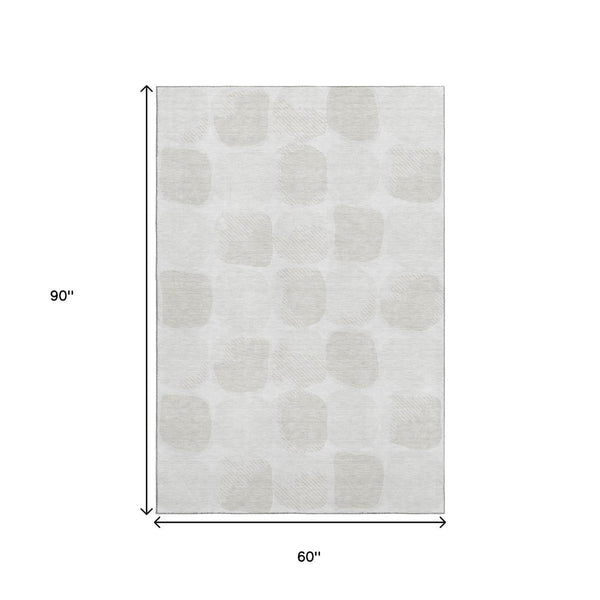 HomeRoots 5' X 8' Ivory and Beige Geometric Washable Area Rug with UV Protection, Perfect for High-Traffic Spaces 669200