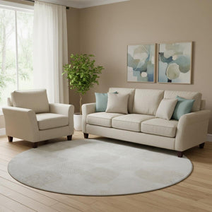 HomeRoots 8' Ivory and Beige Abstract Geometric Washable Round Rug with UV Protection for High-Traffic Areas 669201