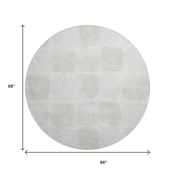 HomeRoots 8' Ivory and Beige Abstract Geometric Washable Round Rug with UV Protection for High-Traffic Areas 669201