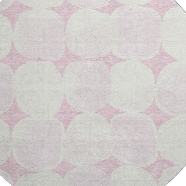 HomeRoots 8' Pink and Ivory Abstract Geometric Round Rug - Washable, UV Protected, Perfect for High-Traffic Areas 669225