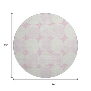 HomeRoots 8' Pink and Ivory Abstract Geometric Round Rug - Washable, UV Protected, Perfect for High-Traffic Areas 669225