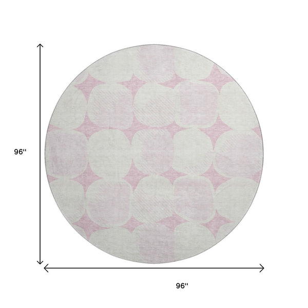 HomeRoots 8' Pink and Ivory Abstract Geometric Round Rug - Washable, UV Protected, Perfect for High-Traffic Areas 669225