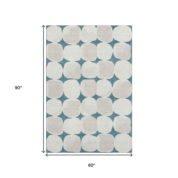 HomeRoots 5' X 8' Teal And Ivory Abstract Geometric Rug - Washable, UV-Protected, Perfect for Busy Homes! 669242