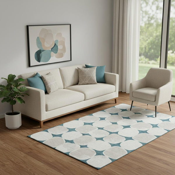 HomeRoots 5' X 8' Teal And Ivory Abstract Geometric Rug - Washable, UV-Protected, Perfect for Busy Homes! 669242
