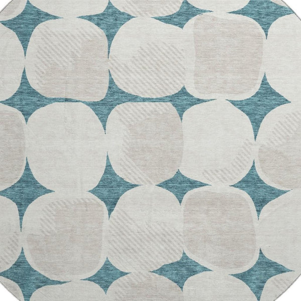 HomeRoots 8' Teal And Ivory Abstract Geometric Washable Round Rug - UV Protection, Stain Resistant & Stylish! 669243