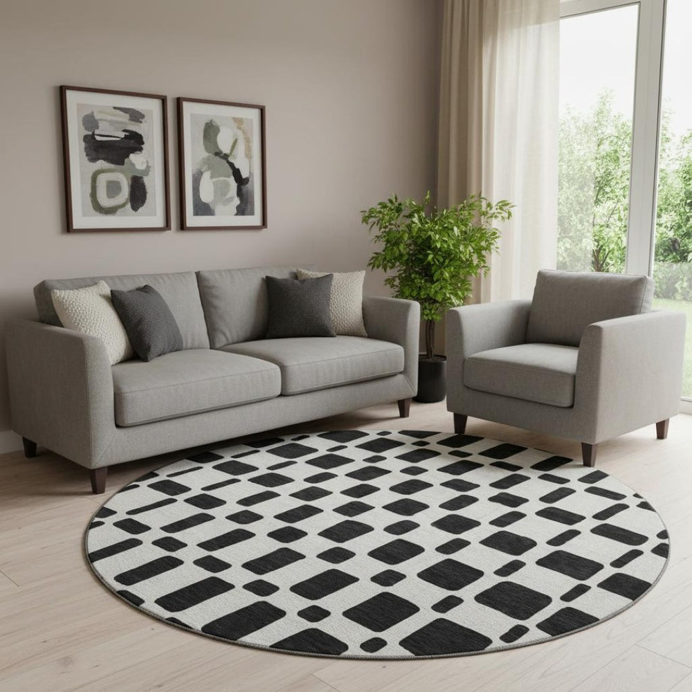 HomeRoots 8' Black and Ivory Geometric Washable Round Rug - Durable, Stain-Resistant, UV Protected Design! 669255
