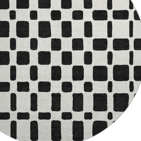 HomeRoots 8' Black and Ivory Geometric Washable Round Rug - Durable, Stain-Resistant, UV Protected Design! 669255
