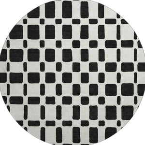 HomeRoots 8' Black and Ivory Geometric Washable Round Rug - Durable, Stain-Resistant, UV Protected Design! 669255