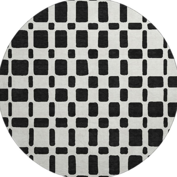 HomeRoots 8' Black and Ivory Geometric Washable Round Rug - Durable, Stain-Resistant, UV Protected Design! 669255