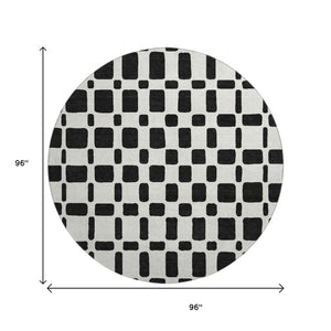 HomeRoots 8' Black and Ivory Geometric Washable Round Rug - Durable, Stain-Resistant, UV Protected Design! 669255