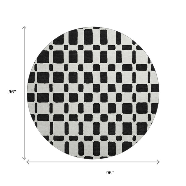 HomeRoots 8' Black and Ivory Geometric Washable Round Rug - Durable, Stain-Resistant, UV Protected Design! 669255