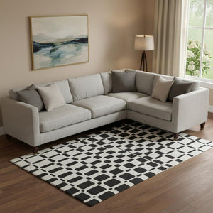 HomeRoots 8' X 10' Black and Ivory Geometric Area Rug – Washable, UV Protected, Durable Design for Modern Homes 669256