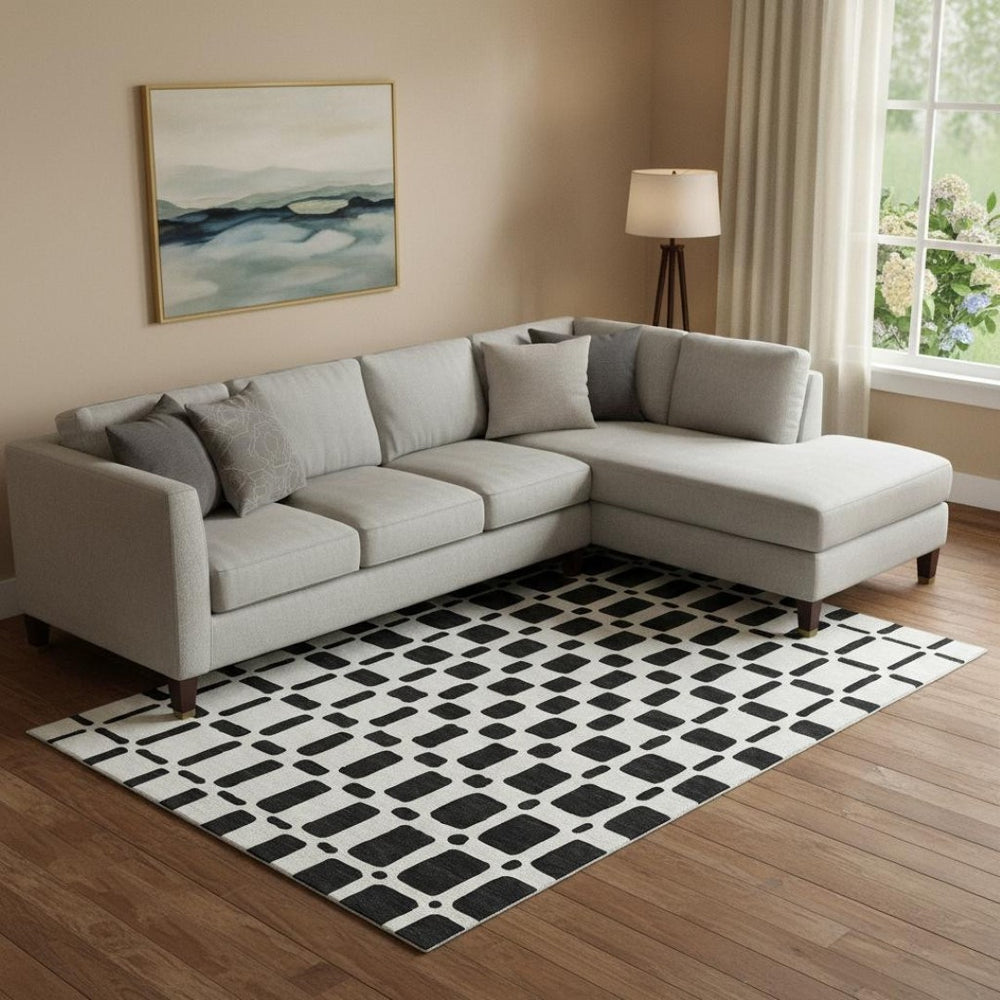 HomeRoots 9' X 12' Modern Black and Ivory Geometric Washable Area Rug with UV Protection for Busy Homes 669257