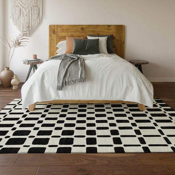 HomeRoots 10' X 14' Black And Ivory Geometric Area Rug - Stylish, Washable, UV-Protected for High-Traffic Spaces 669258