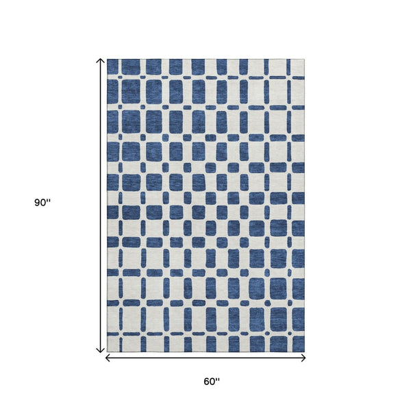 HomeRoots 5' X 8' Navy Blue & Ivory Geometric Area Rug - Washable, UV Protected, Kid & Pet Friendly Design 669290