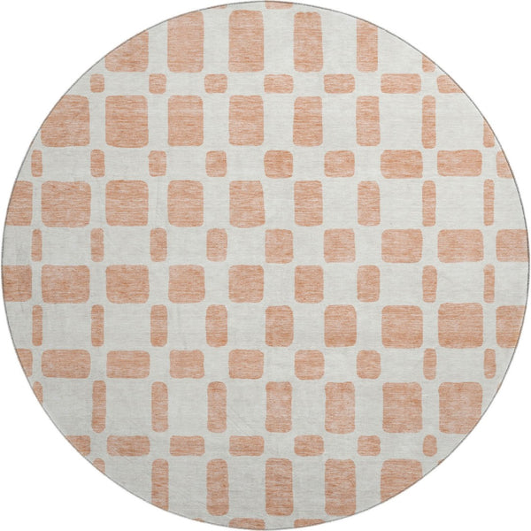 HomeRoots 8' Peach and Ivory Geometric Round Rug - Washable, UV Protected, Stain Resistant for Modern Spaces 669297