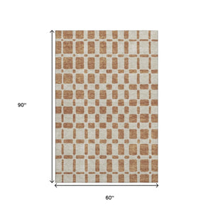 HomeRoots 5' X 8' Terra Cotta & Beige Geometric Area Rug - Washable, UV Protected, Stylish & Durable Choice! 669326