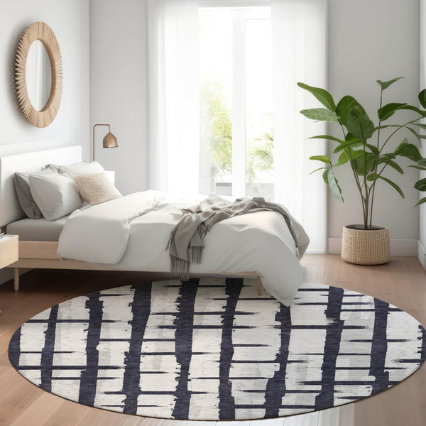 HomeRoots 8' Black and Silver Striped Washable Round Rug - UV-Protected, Stain-Resistant, Perfect for Any Room! 669345