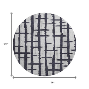 HomeRoots 8' Black and Silver Striped Washable Round Rug - UV-Protected, Stain-Resistant, Perfect for Any Room! 669345