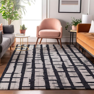 HomeRoots 8' X 10' Stylish Black and Silver Striped Washable Area Rug with UV Protection for Modern Homes 669346