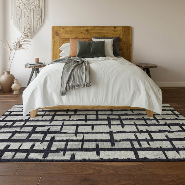 HomeRoots 8' X 10' Stylish Black and Silver Striped Washable Area Rug with UV Protection for Modern Homes 669346